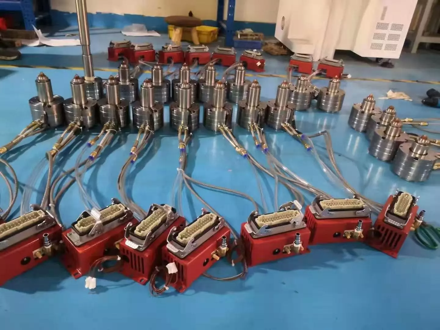 An image showing plastic pellets next to a solid cold runner scrap part